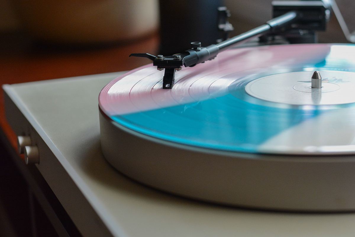 vinyl record on white vinyl player